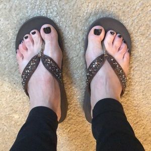 Brown flip flops
